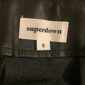 Revolve black mini skirt. Size small. Brand new but no tags- never worn.